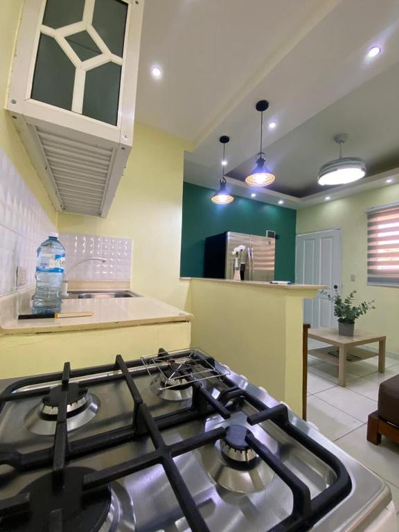 Kuchyň nebo kuchyňský kout v ubytování Apartamentos Melya cerca de la Playa Caleta