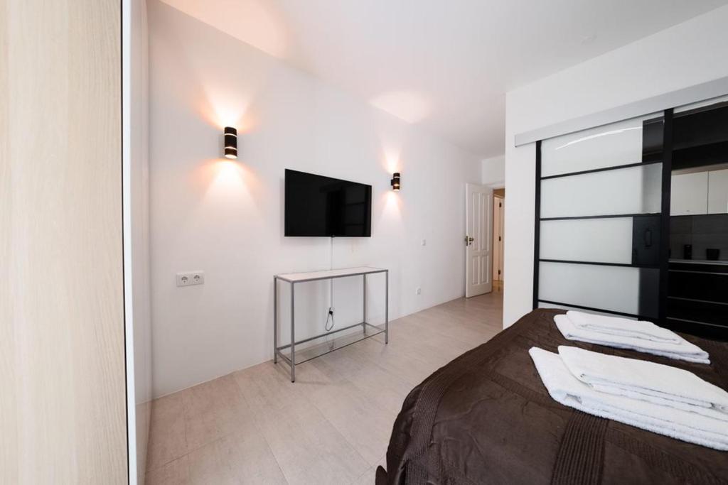 TV a/nebo společenská místnost v ubytování Luxury Apartment near Cascais Town & Marina