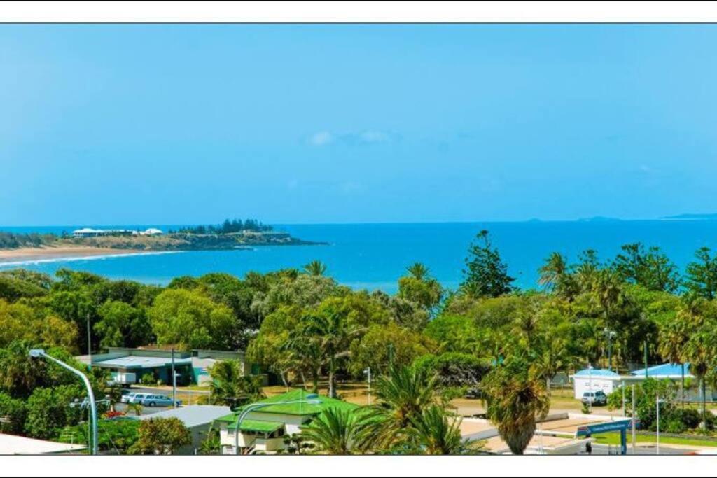 a view of the beach and ocean from a resort at Seacrest on Bright in Emu Park