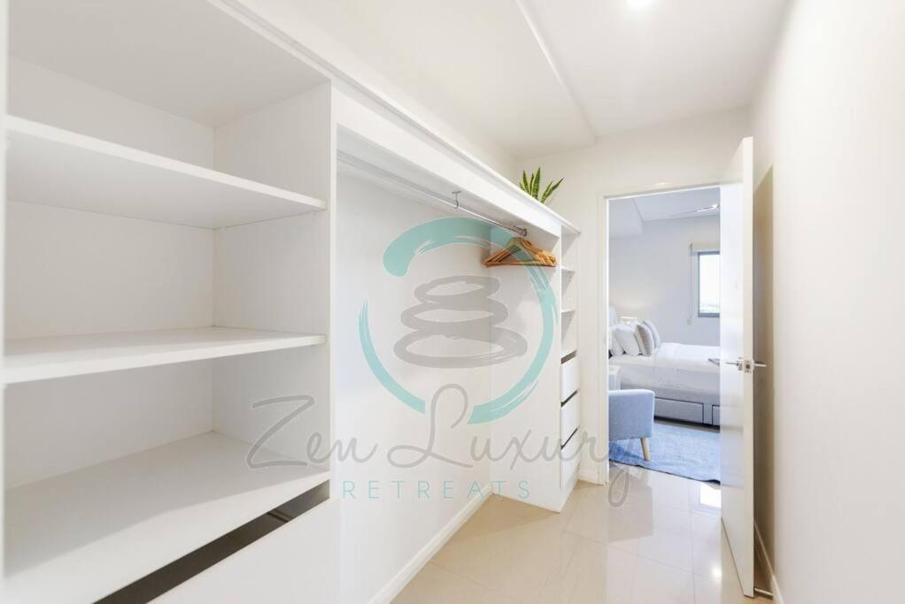 Letto o letti in una camera di ZEN At ARRAY: 2BR Retreat in CBD