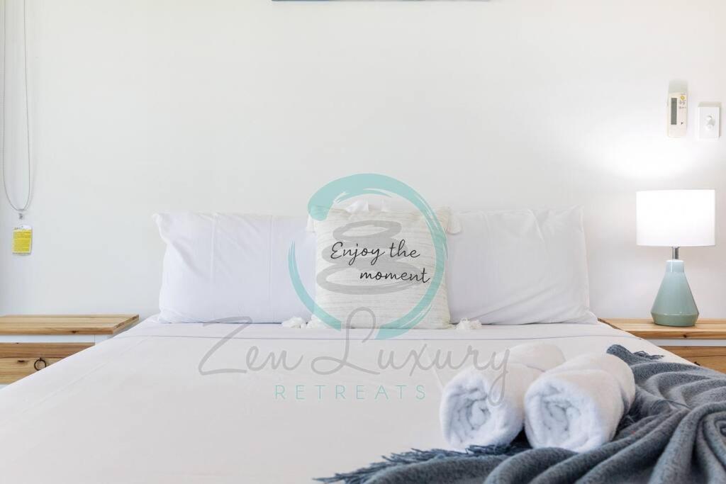 Letto o letti in una camera di ZEN At ARRAY: 2BR Retreat in CBD
