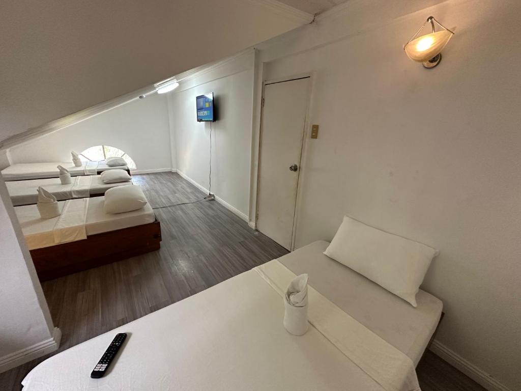 Postel nebo postele na pokoji v ubytování Generosa Beach Club