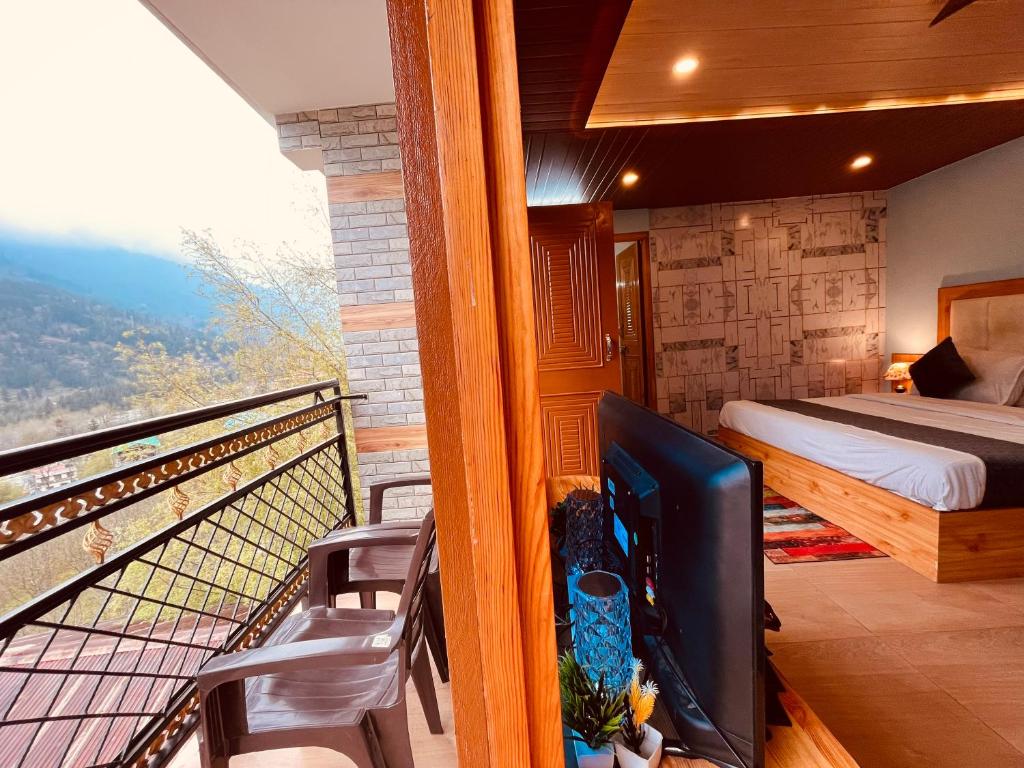 Postel nebo postele na pokoji v ubytování Sana cottage - Affordable Luxury Stay in Manali