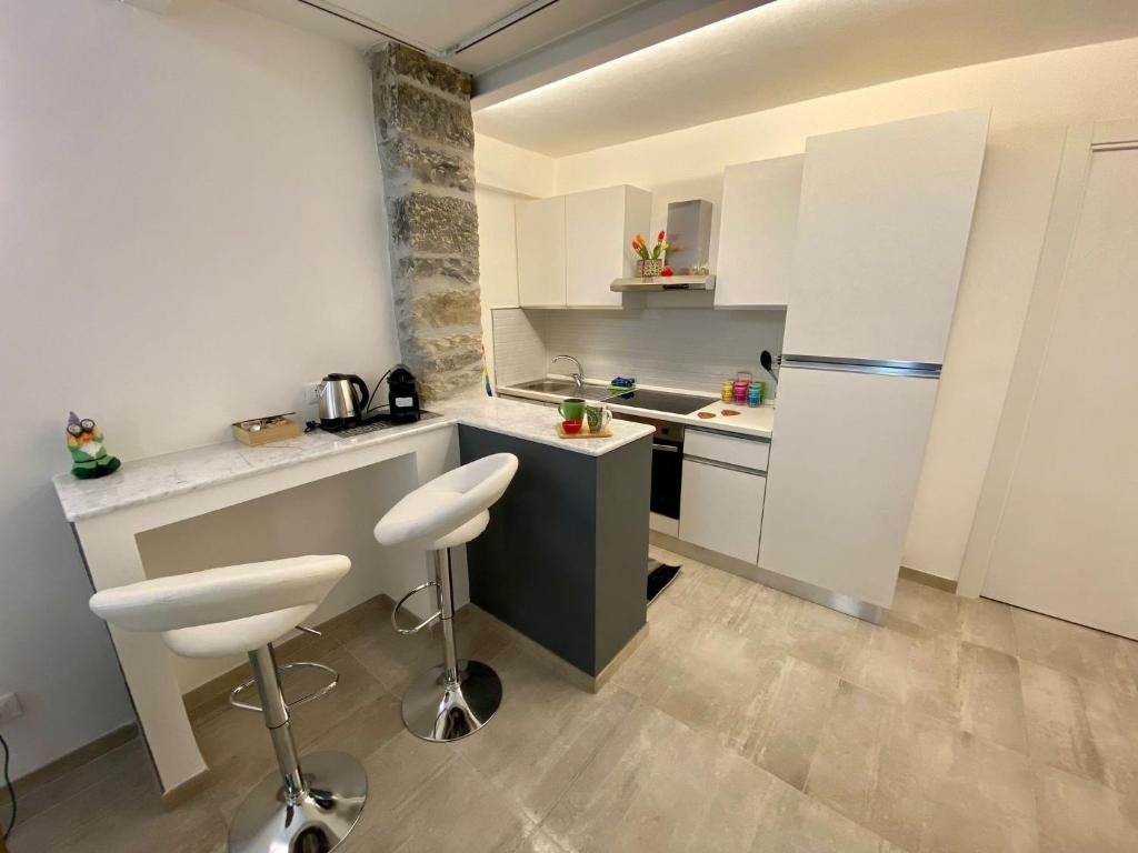 Kuchyň nebo kuchyňský kout v ubytování Loft Nineteen Apartment