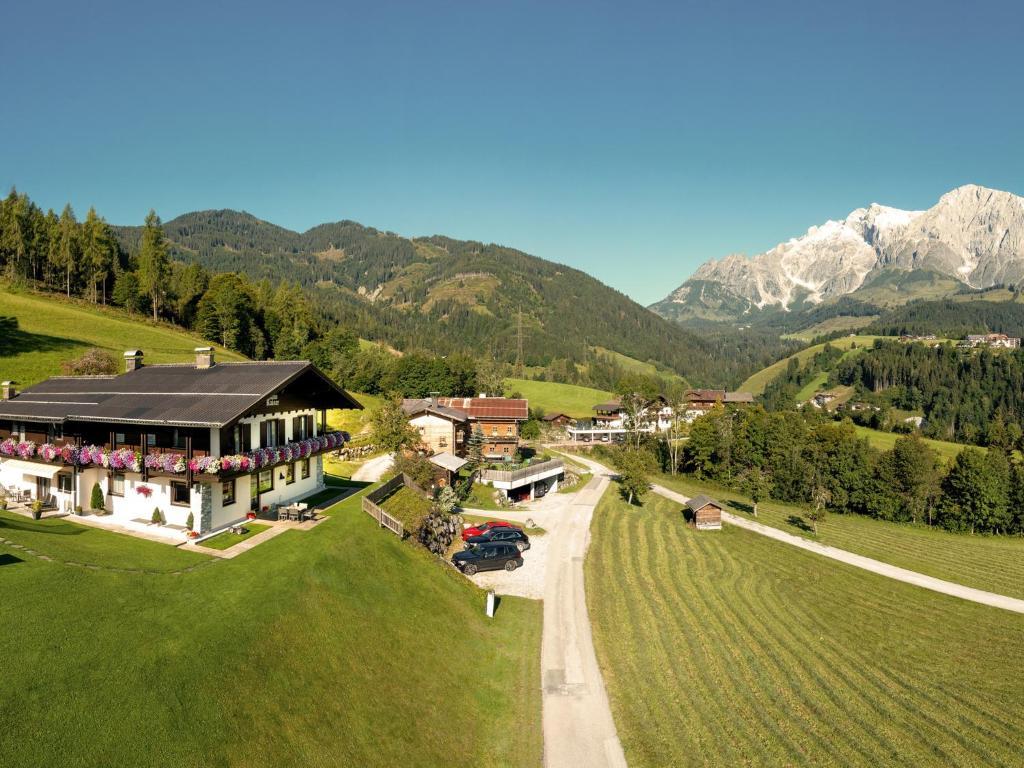 an aerial view of a house in the mountains at Haus Rainer in Mühlbach am Hochkönig