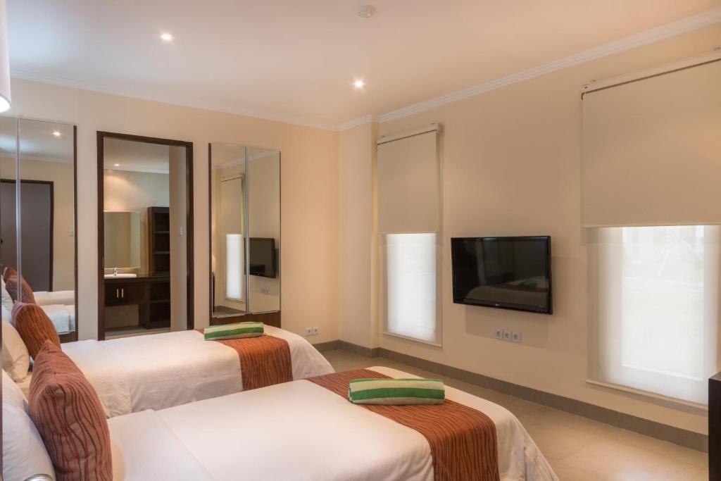 TV a/nebo společenská místnost v ubytování Peninsula Bay Resort