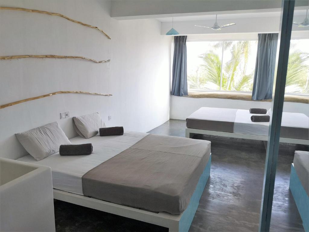 Postel nebo postele na pokoji v ubytování NAVA b&b