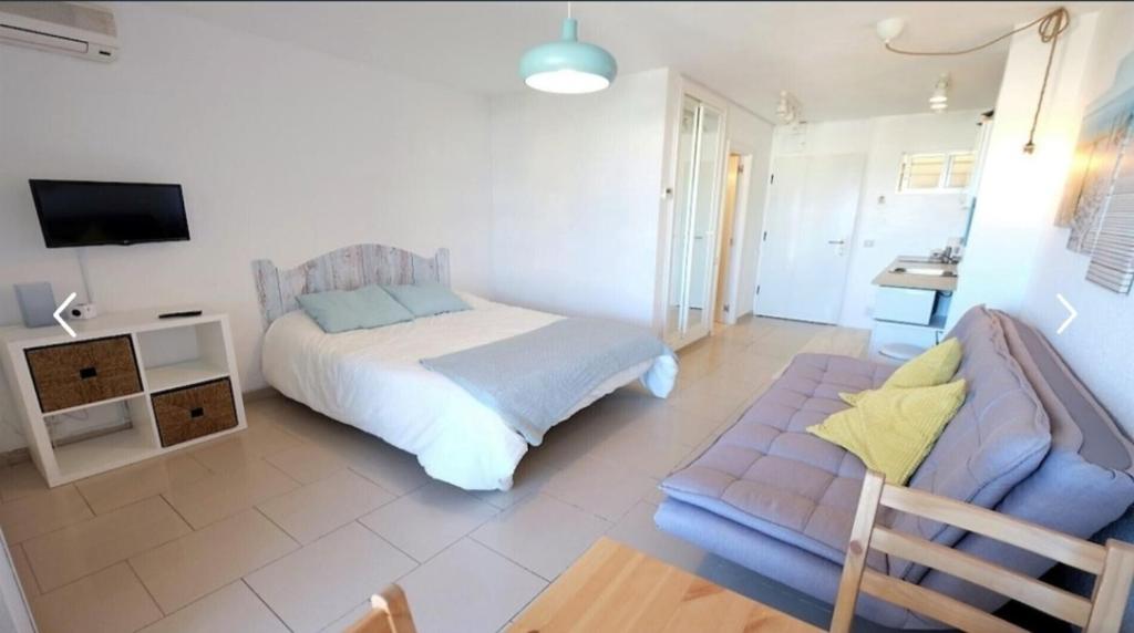 A bed or beds in a room at Brise Marine