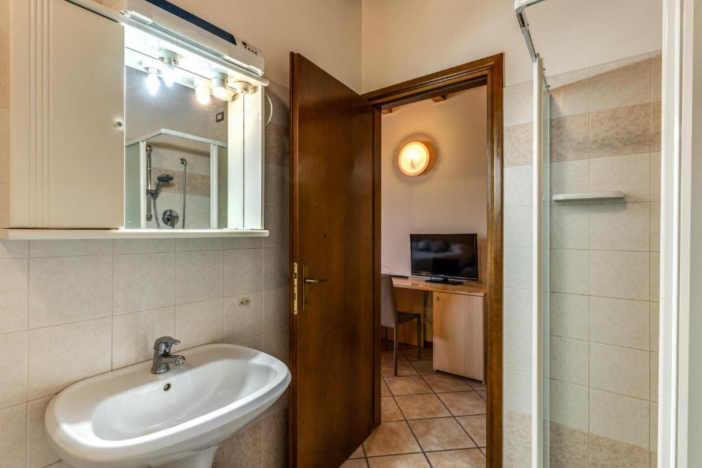 Koupelna v ubytování Agriturismo Pozzo Fiorito