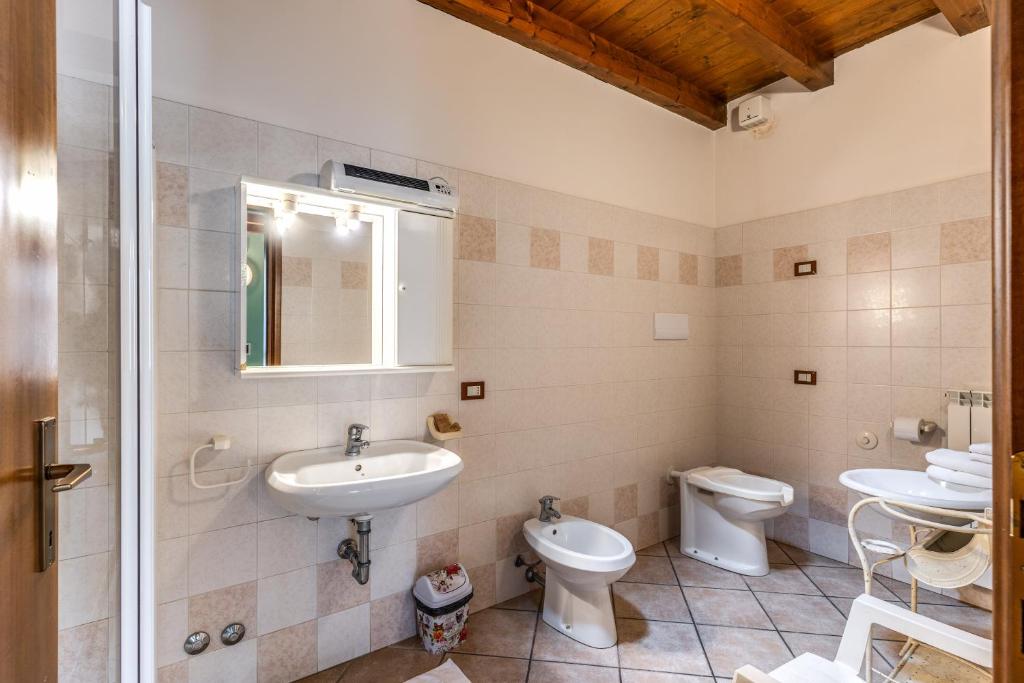 Koupelna v ubytování Agriturismo Pozzo Fiorito