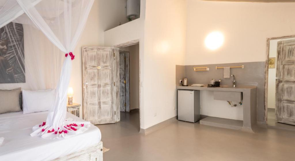Kuchyň nebo kuchyňský kout v ubytování Casamia Suites
