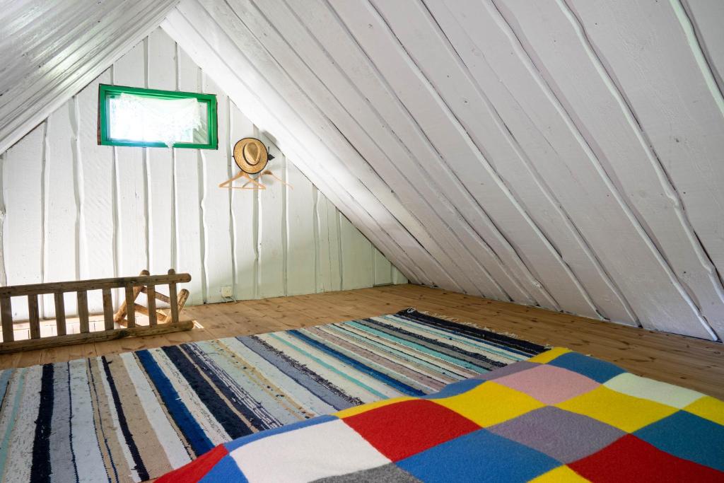 Postel nebo postele na pokoji v ubytování Muhu Namaste