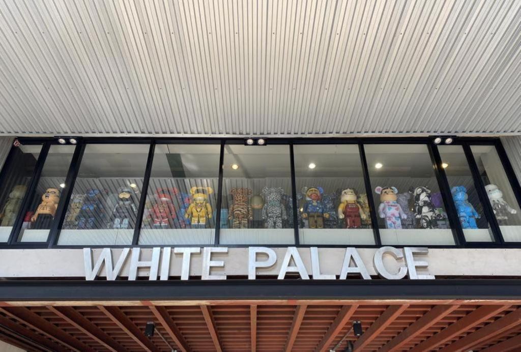 a white palace sign on top of a white palace store at White Palace Bangkok in Bangkok
