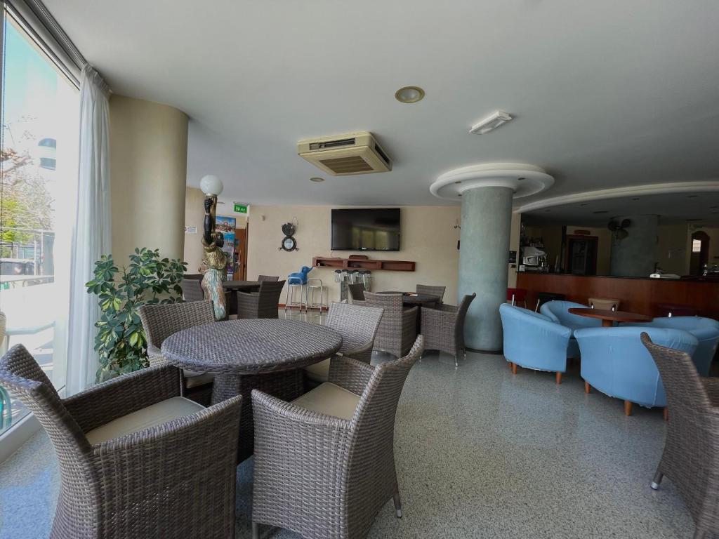 TV a/nebo společenská místnost v ubytování Hotel Pari