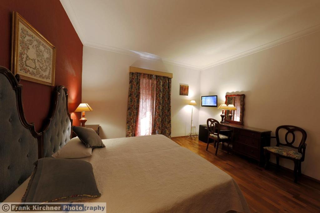 Postel nebo postele na pokoji v ubytování Hotel Castille