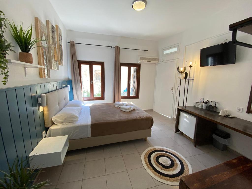 Posteľ alebo postele v izbe v ubytovaní OLD TOWN TALES apartments
