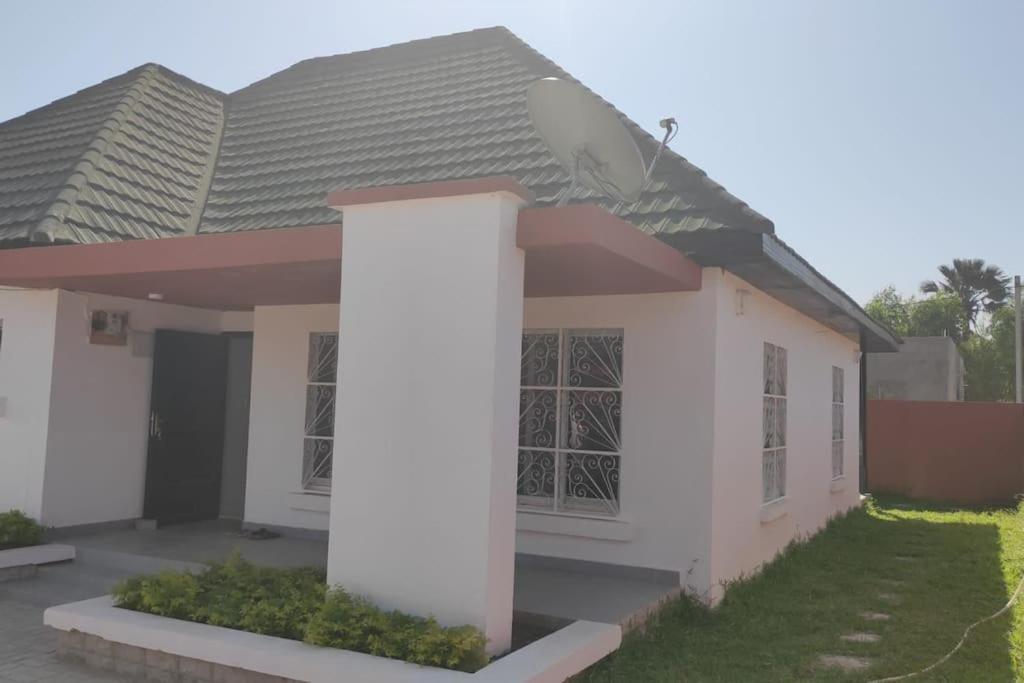 a rendering of a house in a subdivision at House in brufut near the sea / tanji bird reserve in Brufut