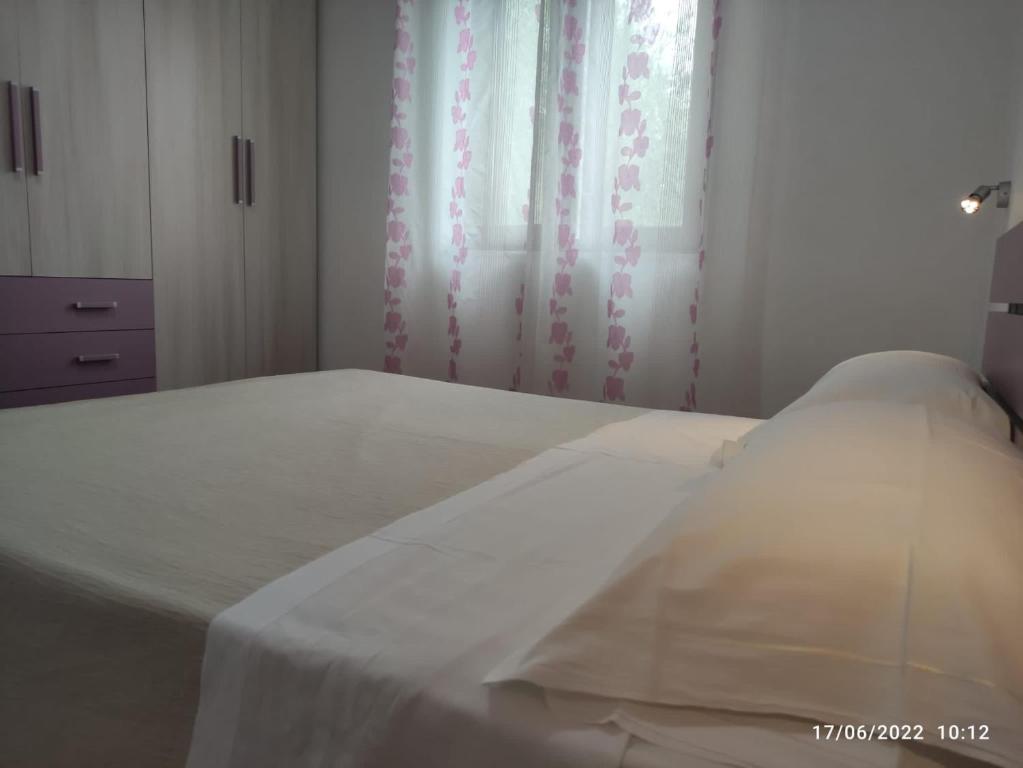 Postel nebo postele na pokoji v ubytování Borgo Cerasa