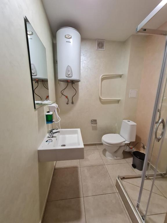 Koupelna v ubytování Hotel Lime