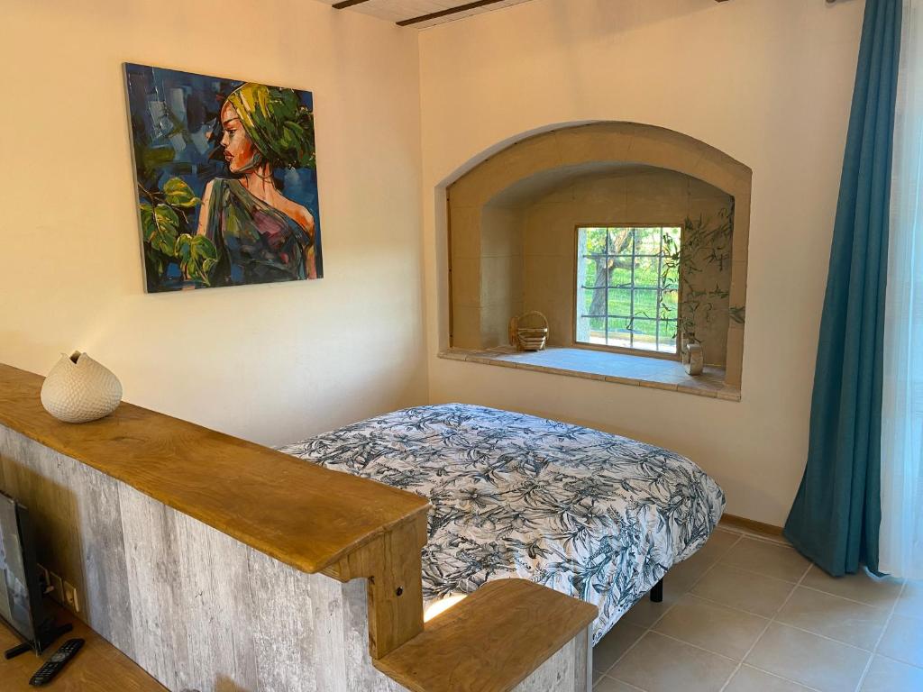 Postel nebo postele na pokoji v ubytování L'Anagramme, chambres, table d'hôtes et gîte pour adultes, naturistes ou non !