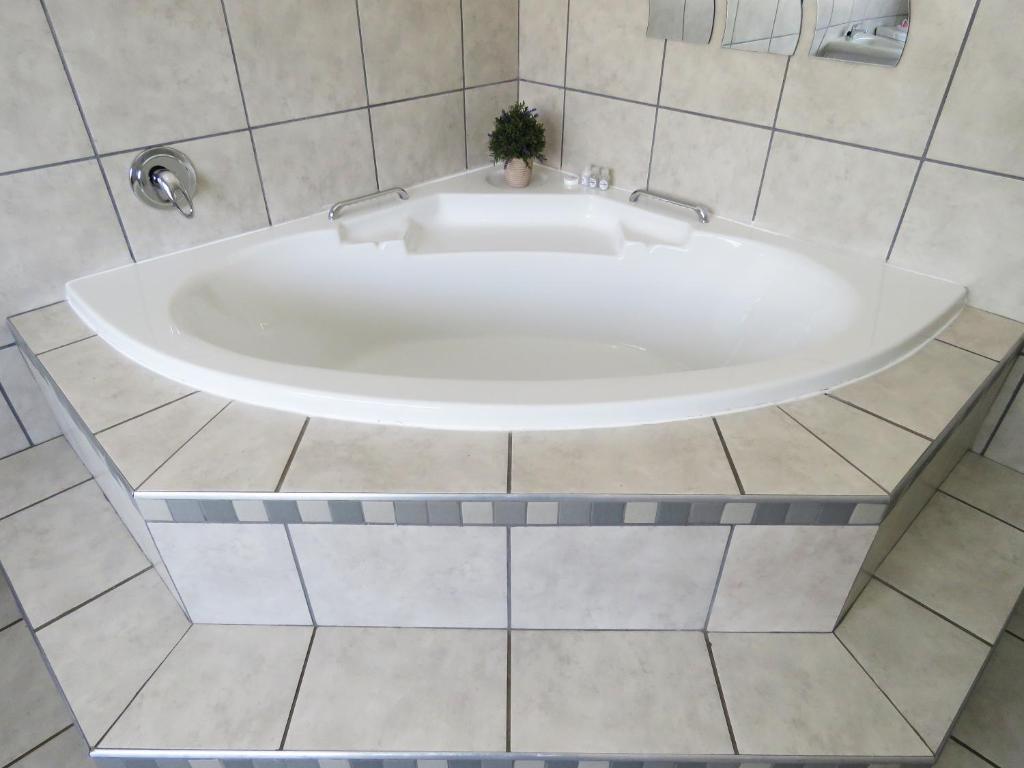 Koupelna v ubytování Andante Guesthouse Klerksdorp
