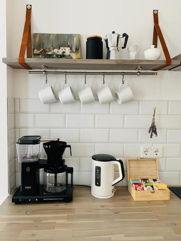 Příslušenství pro přípravu čaje a kávy v ubytování Appartement Weiss