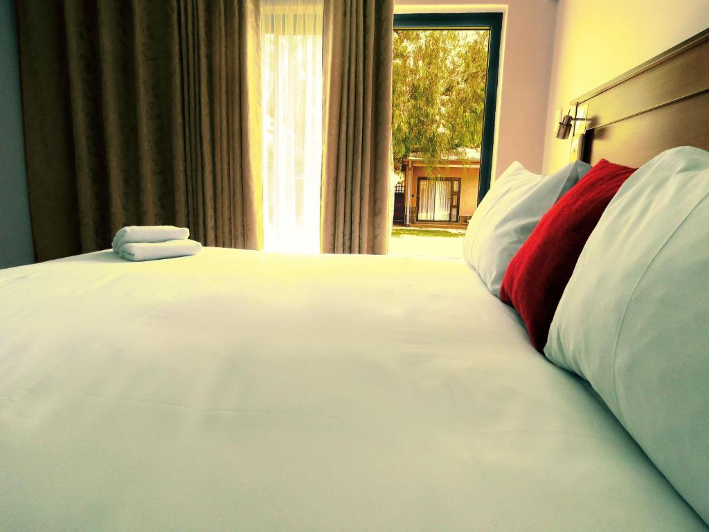Postel nebo postele na pokoji v ubytování Andante Guesthouse Klerksdorp