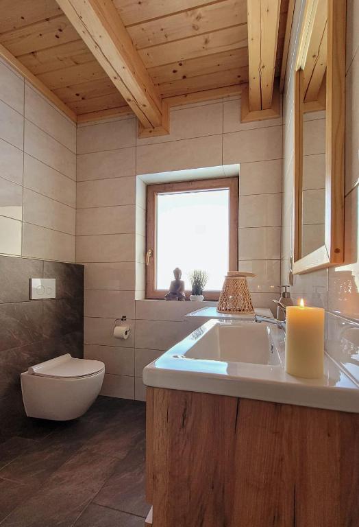 Kúpeľňa v ubytovaní Domki inNatura