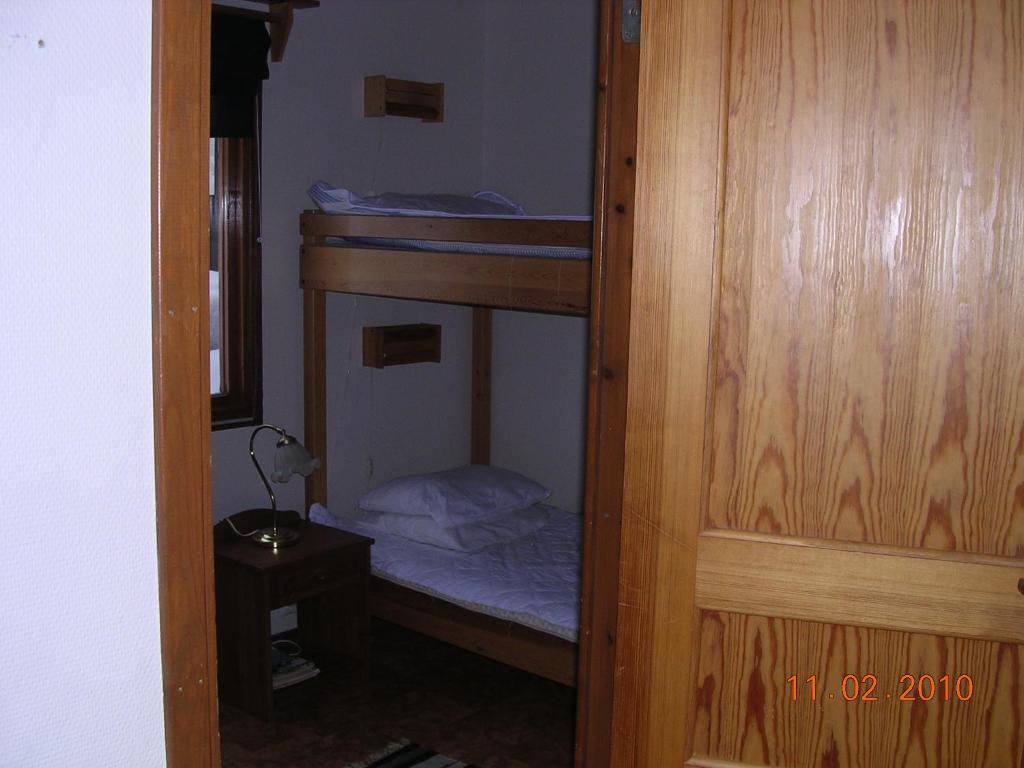 Postel nebo postele na pokoji v ubytování Föllingen stugan