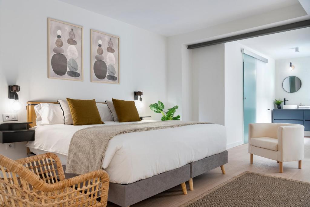 Posteľ alebo postele v izbe v ubytovaní Magno Apartments Castelar