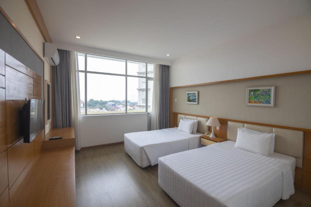 Phòng Deluxe Giường Đôi/2 Giường Đơn Nhìn Ra Thành Phố