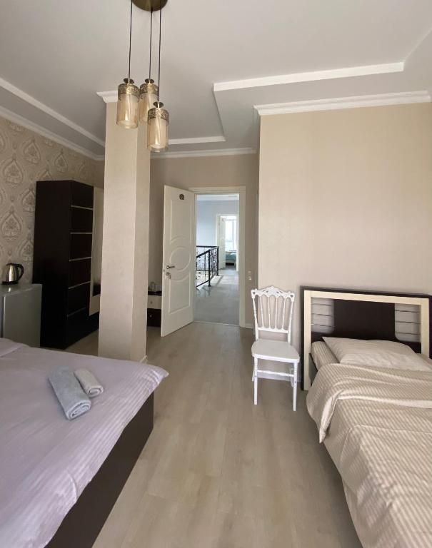 Postel nebo postele na pokoji v ubytování House on Moryakov 55