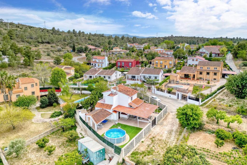 an aerial view of a residential neighborhood with a house at Violeta in Macastre