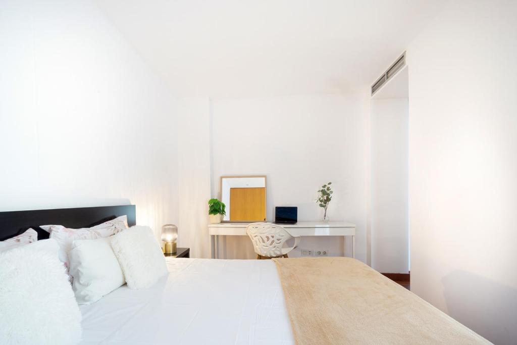 Posteľ alebo postele v izbe v ubytovaní Enjoy Apartments Maria II