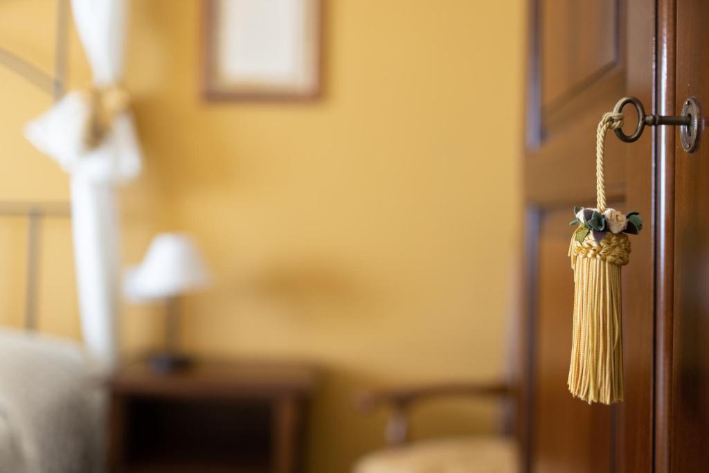 Postel nebo postele na pokoji v ubytování Al Borgo Rooms