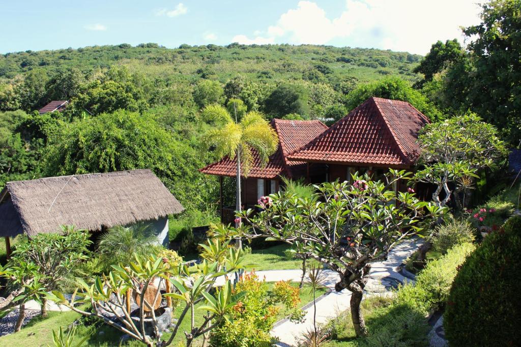 an aerial view of a resort with trees at Bamboo Bungalow Jungle View in Nusa Penida
