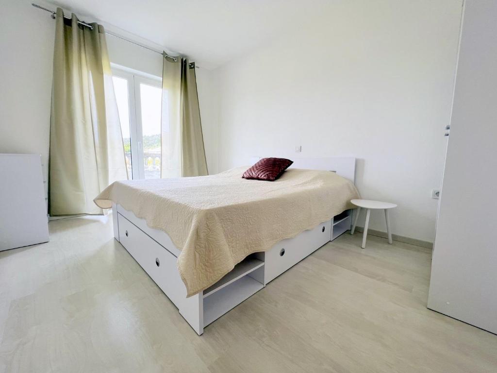 Postel nebo postele na pokoji v ubytování Stel Mar Apartment