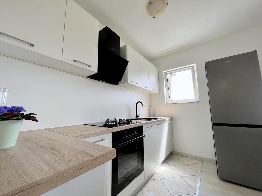 Kuchyň nebo kuchyňský kout v ubytování Stel Mar Apartment
