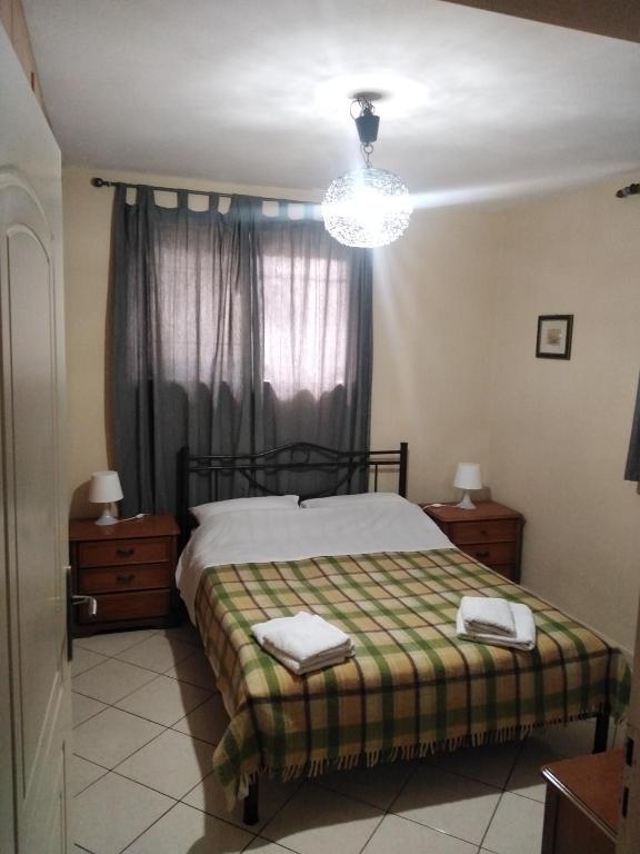Posteľ alebo postele v izbe v ubytovaní Stavros Apartments