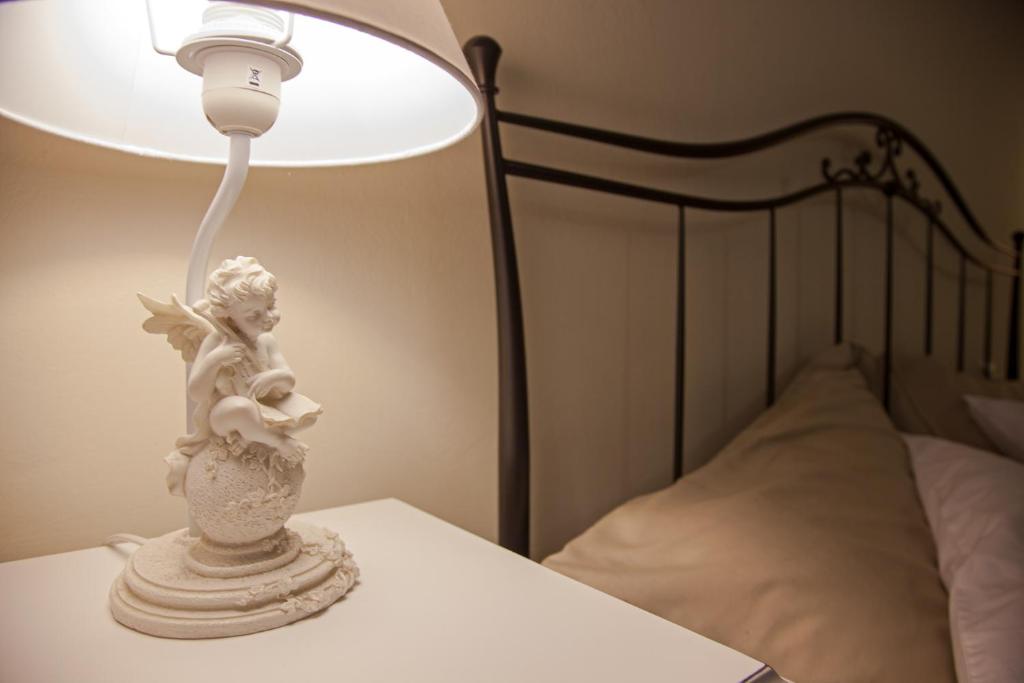Postel nebo postele na pokoji v ubytování Al Borgo Rooms