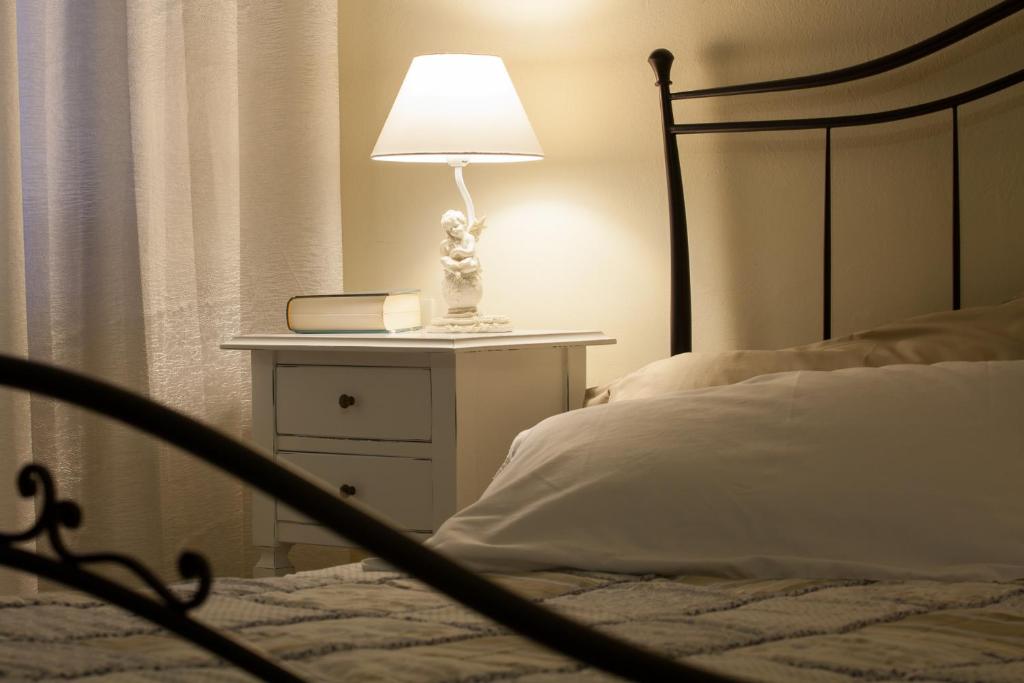 Postel nebo postele na pokoji v ubytování Al Borgo Rooms