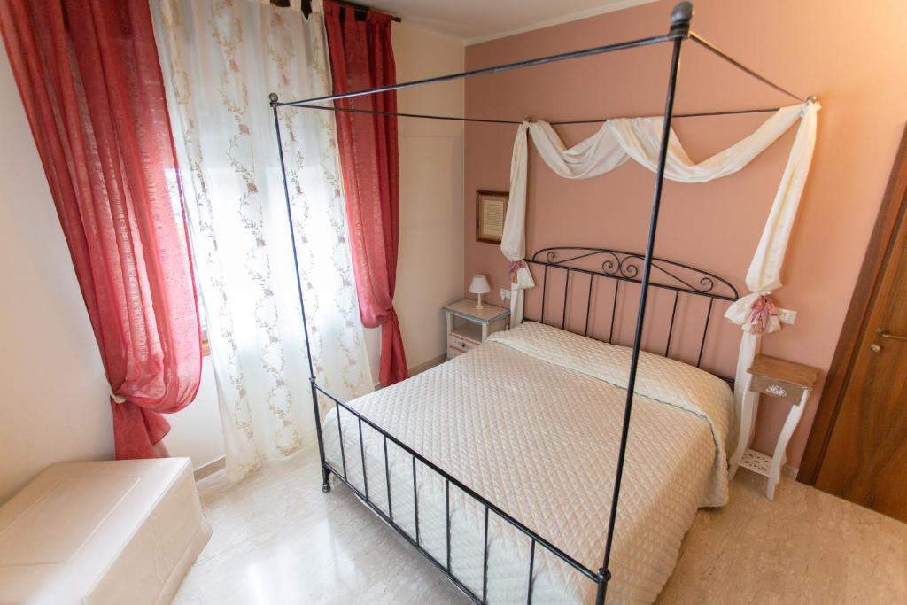 Postel nebo postele na pokoji v ubytování Al Borgo Rooms