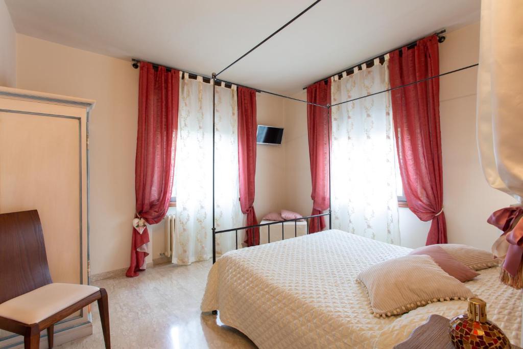 Postel nebo postele na pokoji v ubytování Al Borgo Rooms