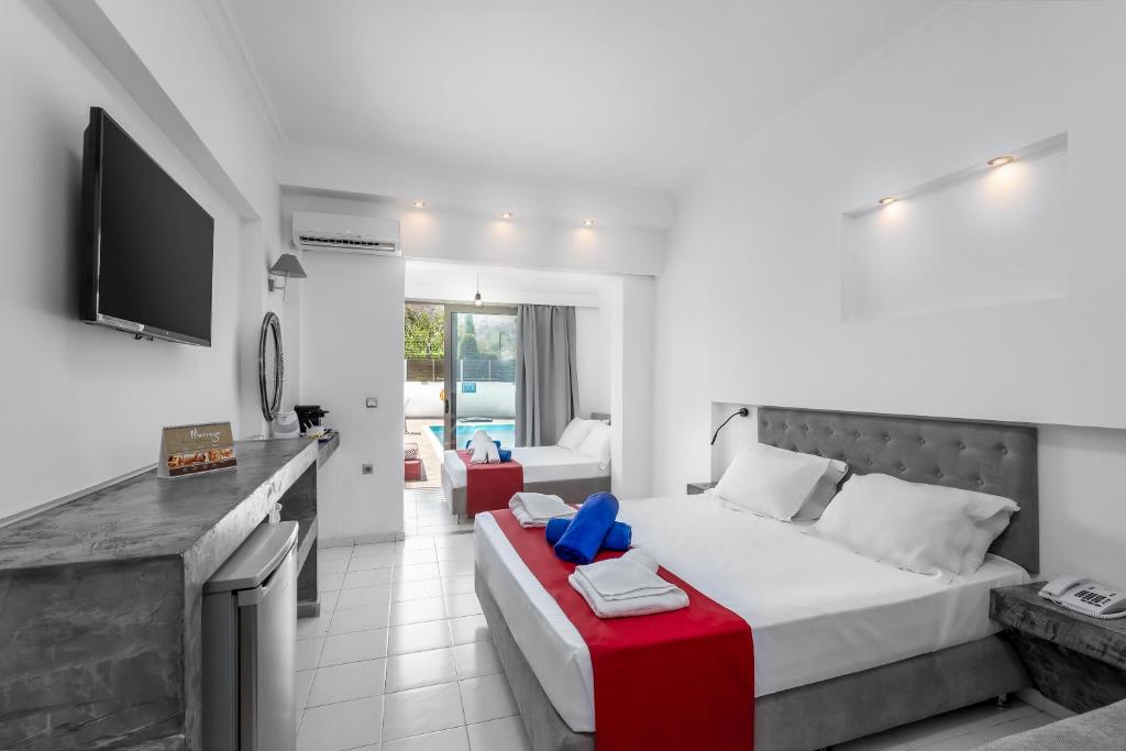 Postel nebo postele na pokoji v ubytování Delfinia Resort - All Inclusive
