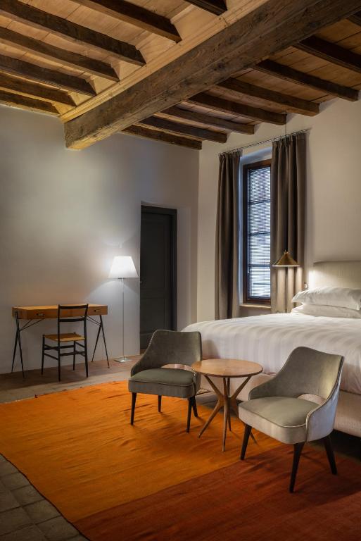 Postel nebo postele na pokoji v ubytování Casa del Pingone
