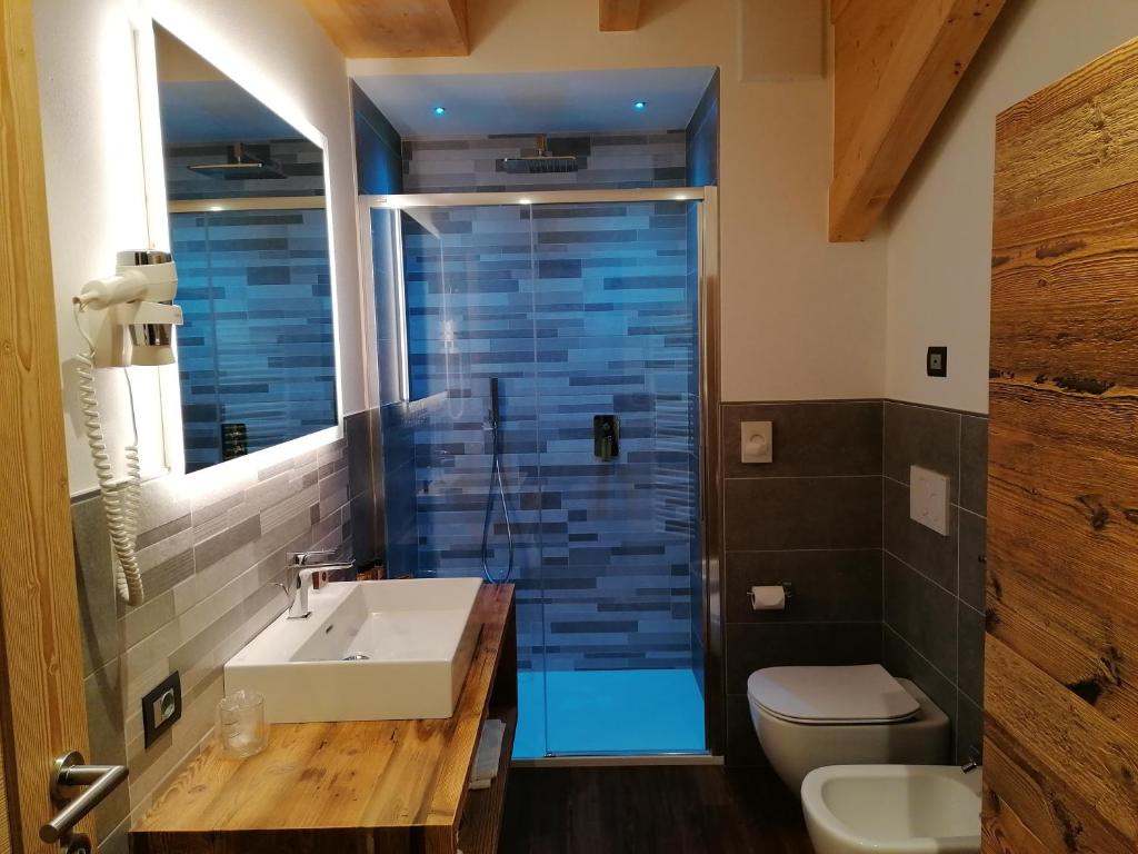 Koupelna v ubytování DOLOMITES B&B - Suites, Apartments and SPA