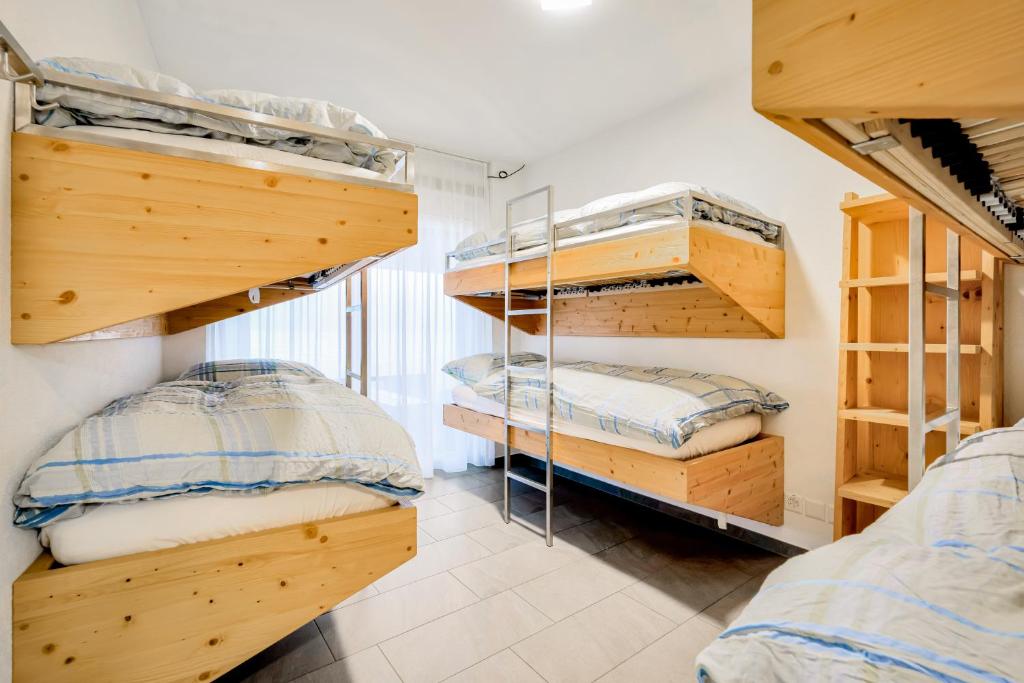 Postel nebo postele na pokoji v ubytování Hotel Restaurant Berghaus Malbun Buchserberg