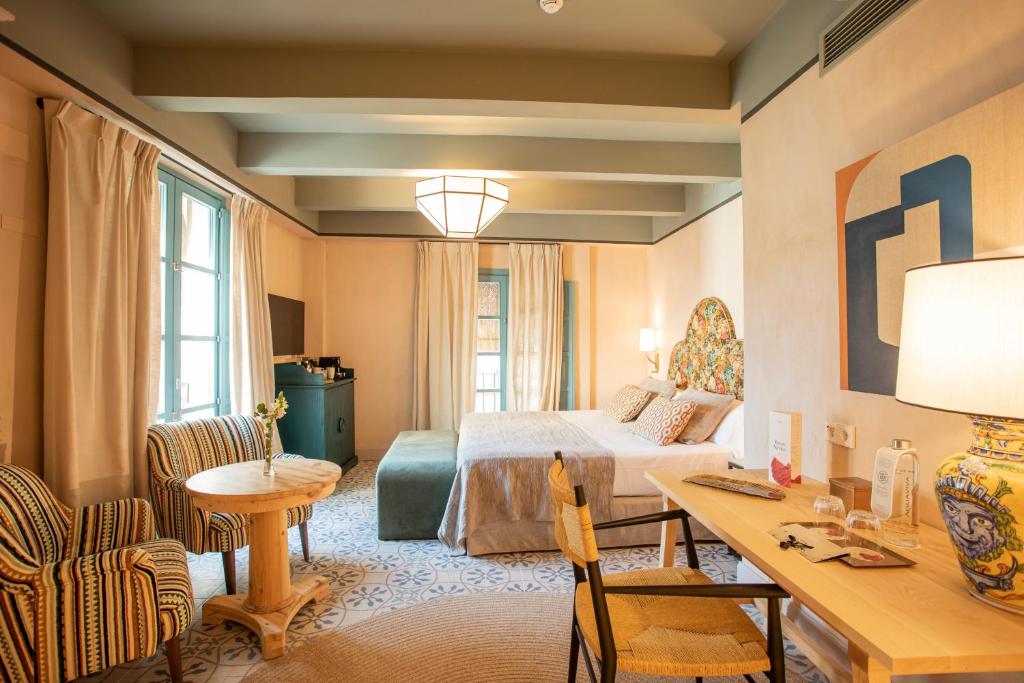 A seating area at Hospes Las Casas del Rey de Baeza, a Member of Design Hotels