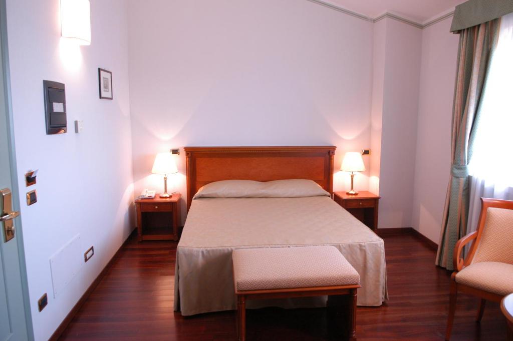 Postel nebo postele na pokoji v ubytování Pilgrim's Hotel