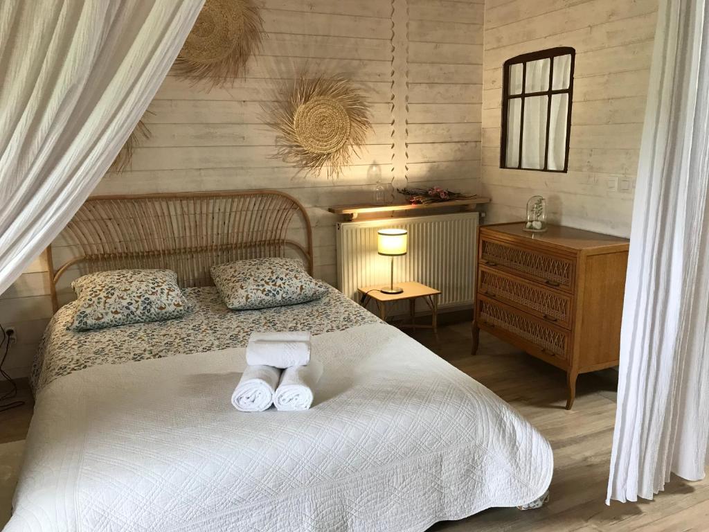 Ένα ή περισσότερα κρεβάτια σε δωμάτιο στο La belle étoile